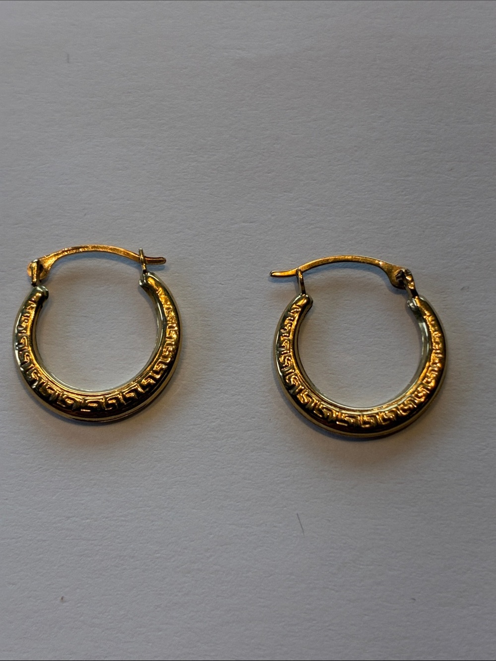 10K Gold Textured Hoop Earrings                  .33 Grams.   1/2 Inch Diameter